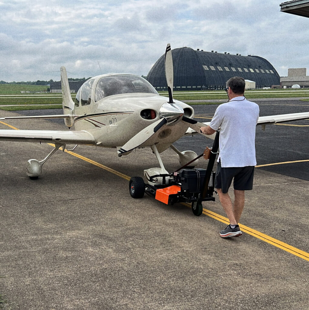 moving a plane on a smooth surface with aircraft tug