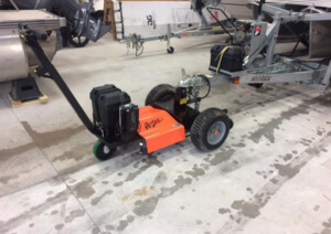 airtug pulling boat in a shop