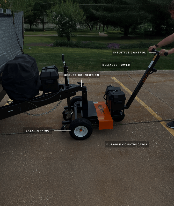 trailer tug attached to trailer with labeling